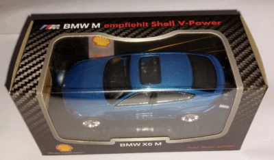 BMW X6 M OVP Modellauto Shell Rückziehmotor Friktionsmotor Schwungrad - Bild 1 von 3