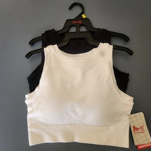 Nuevo con etiquetas Paquete de dos sujetadores deportivos Pro Fit para mujer blanco negro talla mediana - Imagen 1 de 5