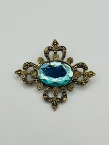 Spilla vintage ornata tono ottone con grande pietra sfaccettata acqua lucite - Foto 1 di 4