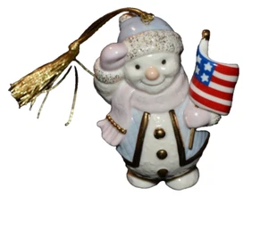 Muñeco de nieve patriótico Lenox Saluting EE. UU. Adorno colgante bandera porcelana en caja - Imagen 1 de 4