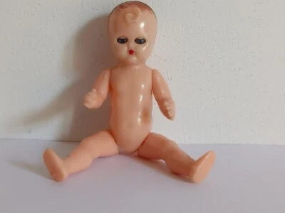 Poupon ancien petit baigneur en celluloïd articulé et aux yeux dormeurs - Photo 1/4