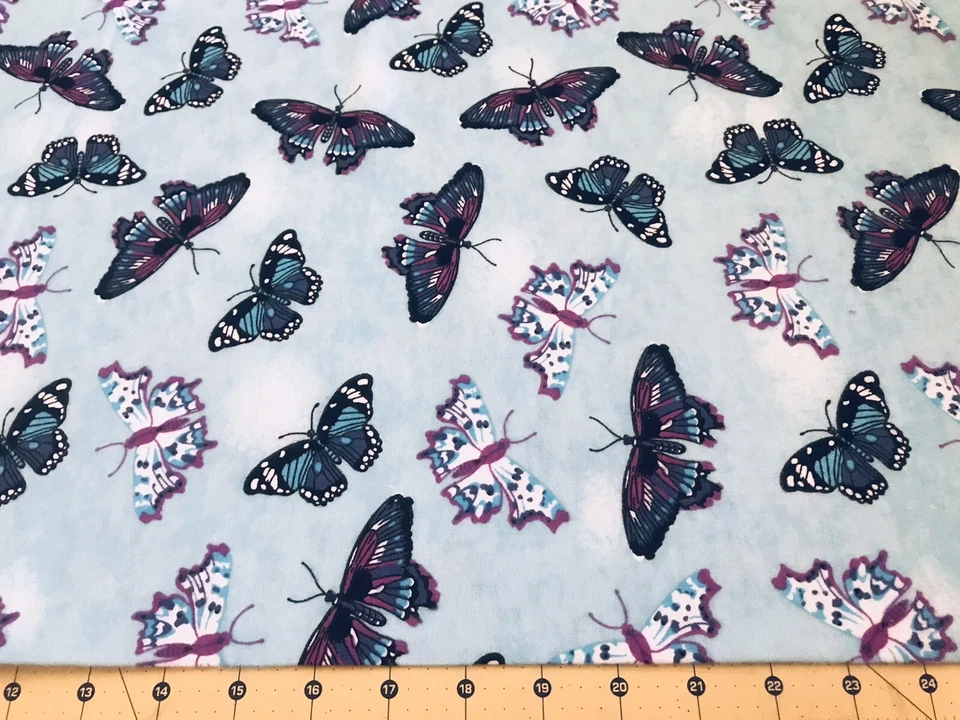 Butterflies on Blue Flannel Fabric Sold By The Yard #2049 - Image 1 of 1