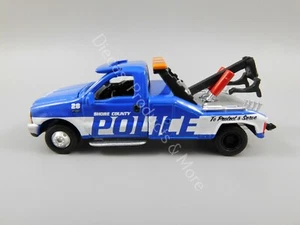 Johnny Lightning LOOSE Active Duty 1999 Ford F-450 Police Tow Truck 1:64 Scale - Picture 1 of 7
