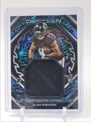 BIJAN ROBINSON 2023 OBSIDIAN ROOKIE UNBREAKABLE PATCH FALCONS RC /199 Q5700 - Image 1 of 2