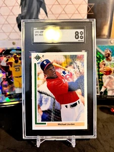 ⭐️ TARJETA DE BÉISBOL MICHEAL JORDAN 1991 CUBIERTA SUPERIOR #SP1 SGC 8 CASI NUEVA-MT GRADO RC SP 🙂 - Imagen 1 de 2