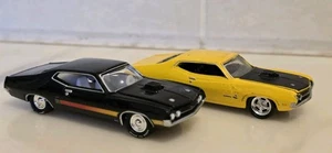 Lot of 2 JOHNNY LIGHTNING 1970 FORD TORINO GT BLACK Real Riders Yellow Cobra - Picture 1 of 12