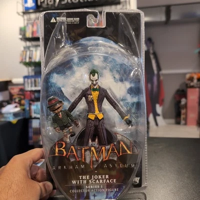 Figura de acción Batman Arkham Asylum DC Collectibles "The Joker with Scarface" Foto 1 de 4
