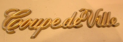 Cadillac 1980-90 cupé Deville plástico dorado logotipo emblema insignia Foto 1 de 2
