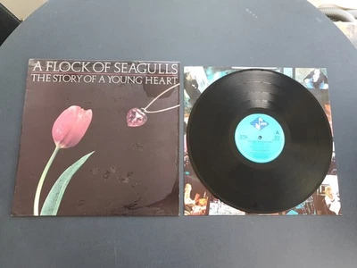 A FLOCK OF SEAGULLS - THE STORY OF A YOUNG HEART 1984 UK  12" VINYL RECORD LP EX - Image 1 of 4