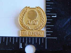 XXVI OLYMPIADE OLYMPIC SPONSOR AT&T PIN - Bild 1 von 2