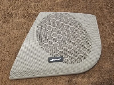 06-11 CADILLAC DTS DRIVER SIDE BOSE FRONT DOOR SPEAKER GRILLE TITANIUM (GREY) - Image 1 of 2