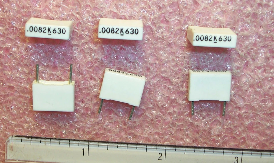 QTY (100) 8200pf 630V 10% RADIAL METALLIZED BOX FILM CAPACITORS 167-822K630B - Image 1 of 1