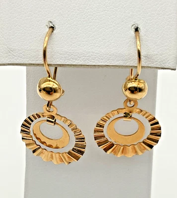 Pendientes circulares colgantes de oro rosa de 18 quilates Foto 1 de 4