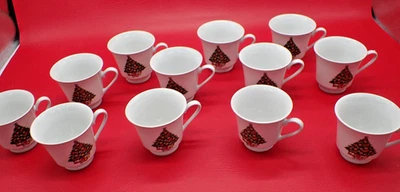 Juego de 12 tazas de Navidad Treasure Jamestown China SIN USAR Foto 1 de 4