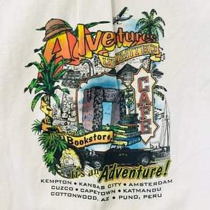 💥Adventures Unlimited Cafe Buchhandlung Herren Cobra Gr. L Beige Knopf Short Grafik - Bild 1 von 9