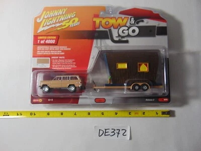 JOHNNY LIGHTNING 1981 JEEP WAGONEER WITH TRAILER TOW AND GO NEW CAMEO TAN - Image 1 of 4