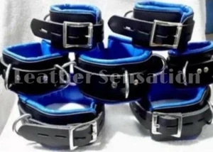 7-teiliges Lederfesselset mit schwarzen Beschlägen und blauen Paspeln und Faden - Bild 1 von 3