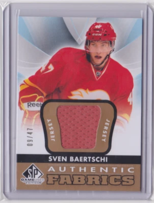 2012-13 UD SP GAME USED AUTHENTIC FABRICS GOLD 9/47 SVEN BAERTSCHI #AF-SV FLAMES - Image 1 of 2