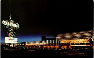 Vintage Postcard Hotel Stardust at Night ~ Casino Lido De Paris Las Vegas  NV - Picture 1 of 3