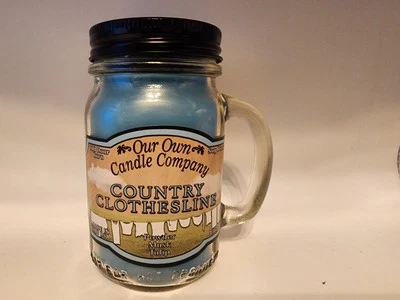 Perfume Country Clothesline, tarro de albañil de 13 oz Our Own Candle Company, 100 horas de combustión Foto 1 de 2
