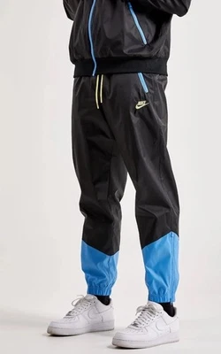 $95 Nike Men’s Windrunner Woven Lined Pants DX0653-010- Black/Blue- Small-New - Image 1 of 4
