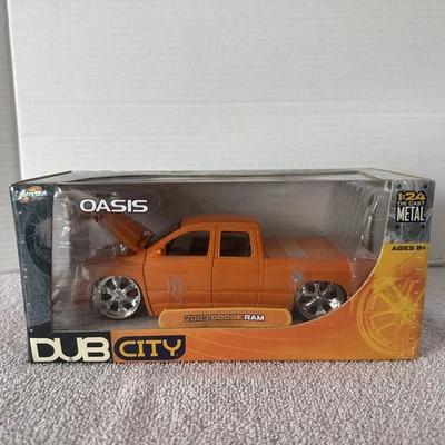 JADA TOYS 1:24 DUB CITY 2003 DODGE RAM ORANGE VERSION - Image 1 of 4