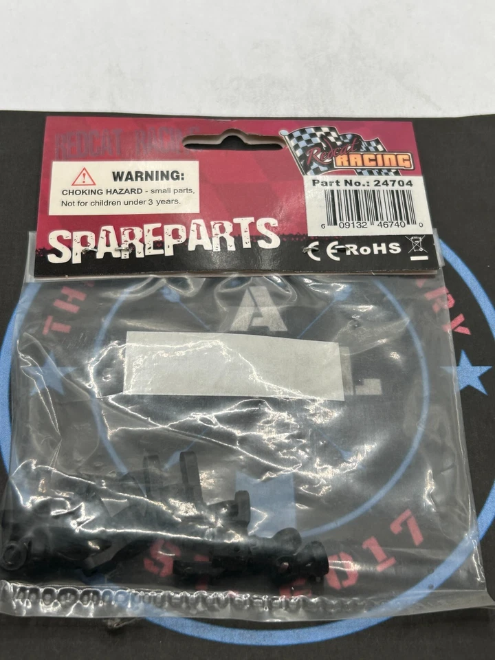 Redcat. #24704. Shock Top Mount and Wheel Hub Carriers - Image 1 of 1