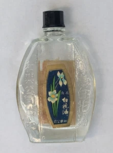 Botella de aceite medicinal vintage White Flower con etiqueta y tapa 3 3/8 h, 2 1/8 pulgadas con - Imagen 1 de 3