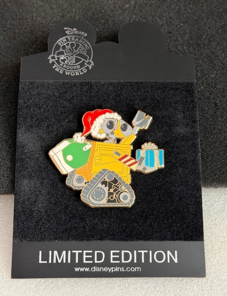 Prendedor DS Disney Store Wall-E con Presente Santa Claus Serie LE 300 Foto 1 de 1