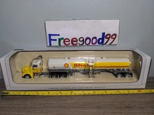 Olio guscio pressofuso 1:64 SpecCast Peterbilt 385 con serbatoio carburante 33002 retro - Foto 1 di 16