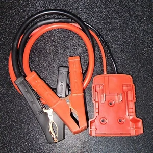 "Milw Red" jump starter.   Requires "Milw Red" 18 v lithium ion battery pack. - Picture 1 of 4