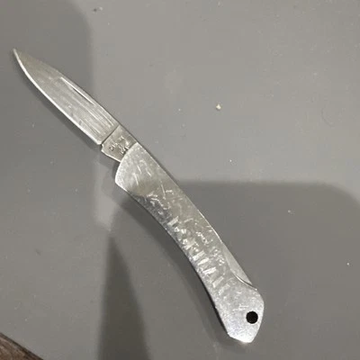 Case XX M1058L SSP 5 Star All Stainless Lock Back. Has Advertisement On One Side - Image 1 of 4