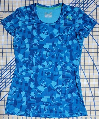 Camisa Under Armour ajustada Heat Gear para mujer talla pequeña patrón geométrico azul Foto 1 de 4