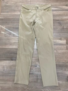 Pantalones elásticos informales de golf Lululemon ABC para hombre 32X33 ajustados Warpstreme tostados - Imagen 1 de 9