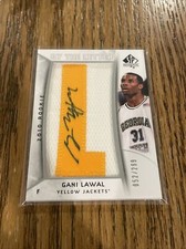 2010-11 SP Authentic By the Letter Gani Lawal Auto 052/299 #217