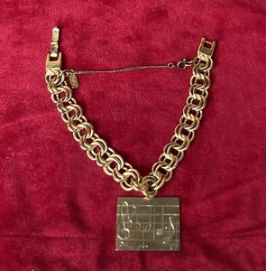MONET 1960's Gold Tone Double Link Charm Bracelet w/Safety Chain Sheet Music - Picture 1 of 5