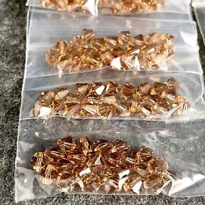 5mm bicone crystal beads Swarovski? - 288 pcs - light and dark topaz - Picture 1 of 3