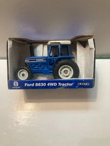 New 2002 ERTL Ford 8630 4WD Tractor 1:32 - Picture 1 of 4