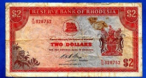 Letrero de 2 dólares Rhodesia P31g N H B Bruce Wmk Cecil Rhodes 29.6.1973 en estado bastante bueno ex raro - Imagen 1 de 2