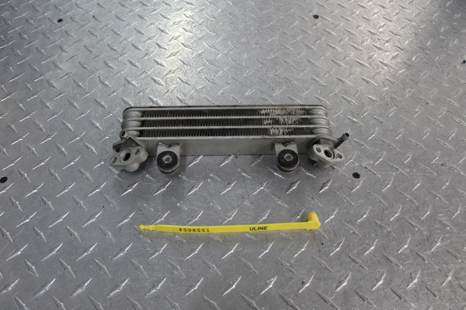 1986 HONDA INTERCEPTOR 750 VFR750F ENGINE MOTOR OIL COOLER DAMAGE - Image 1 of 4