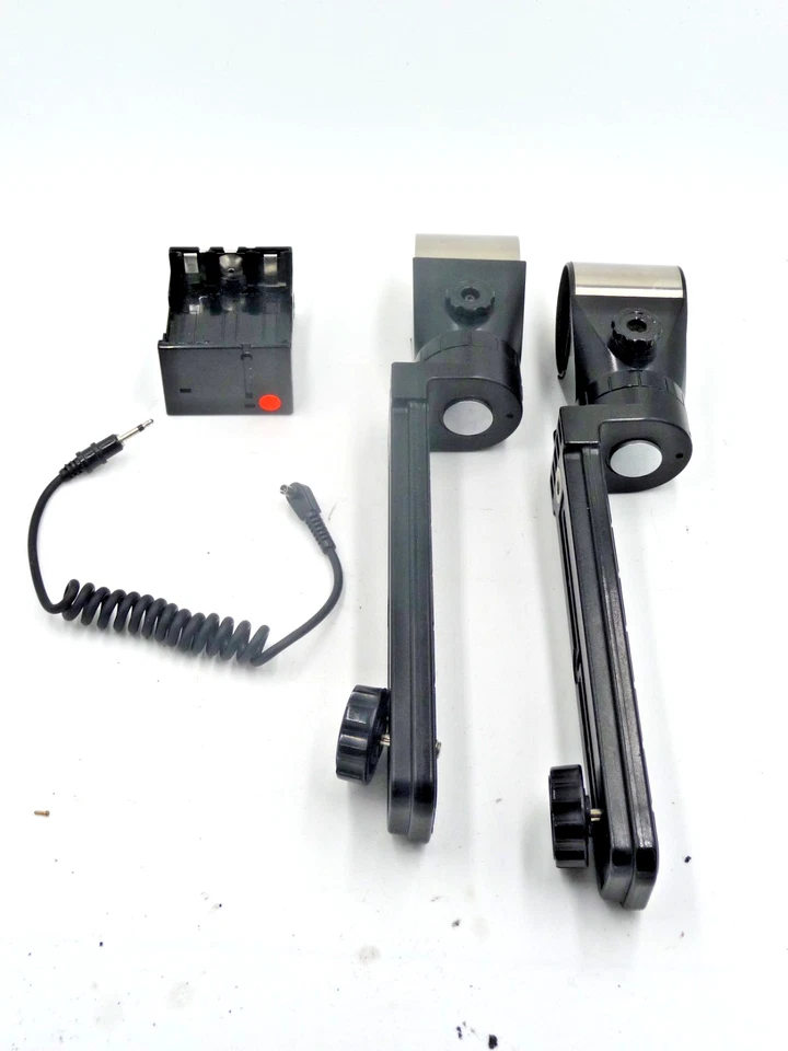 Sunpak auto 544 (4205G) flash mounting brackets, battery holder and sync cord - Image 1 of 4