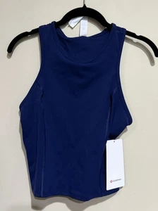 Nuevo con etiquetas Camiseta sin mangas Lululemon talla 4 Nulux Racerback recortada NISE azul marino $58 - Imagen 1 de 4