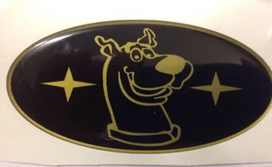 SCOOBY DOO CAR DOMED BONNET GRILL BADGE BLACK & GOLD SUBA IMPRE 100 X 50MM 01-07 - Picture 1 of 4