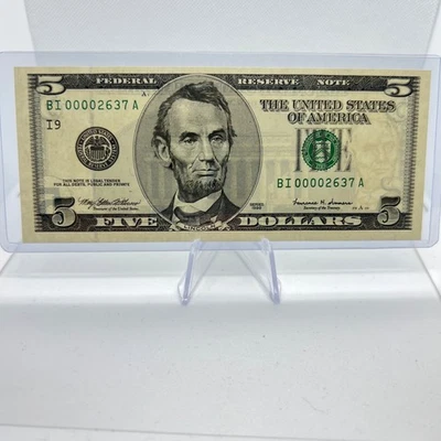 UNC Low Serial Number $5 Dollar Bill Series 1999 (00002637) Old US Currency - Image 1 of 3