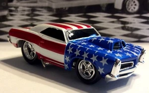 MUSCLE MACHINES STARS & STRIPES 1966 PONTIAC GTO -DIECAST 66 GTO - Picture 1 of 4