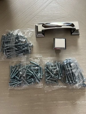 Lote de herrajes para gabinete cromados Atlas Homewares - 35 perillas y 23 tiradores de taza Foto 1 de 4