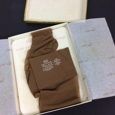 Medias Sears adhesivas un par 8,5-9,5 tostadas beige nailon hasta los muslos Foto 1 de 4