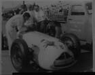 Mechanics work on Duke Nalon's #38 Novi Mobil Special in the pi 1950 Indy Photo