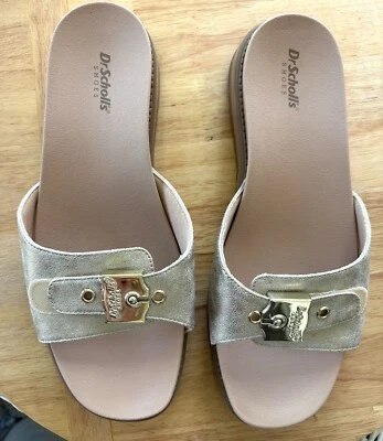 Sandalias Dr Scholls Island Icon para mujer con hebilla dorada de 10 W deslizable Foto 1 de 4