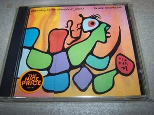 BRUCE COCKBURN "DANCIN IN THE DRAGONS JAW US CD WIE NEU - Bild 1 von 2